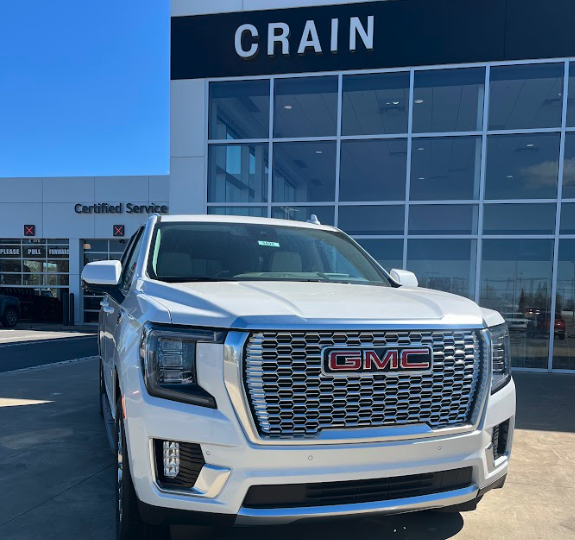 White GMC SUV parked outside Crain Buick GMC’s Certified Service center in Conway, Arkansas